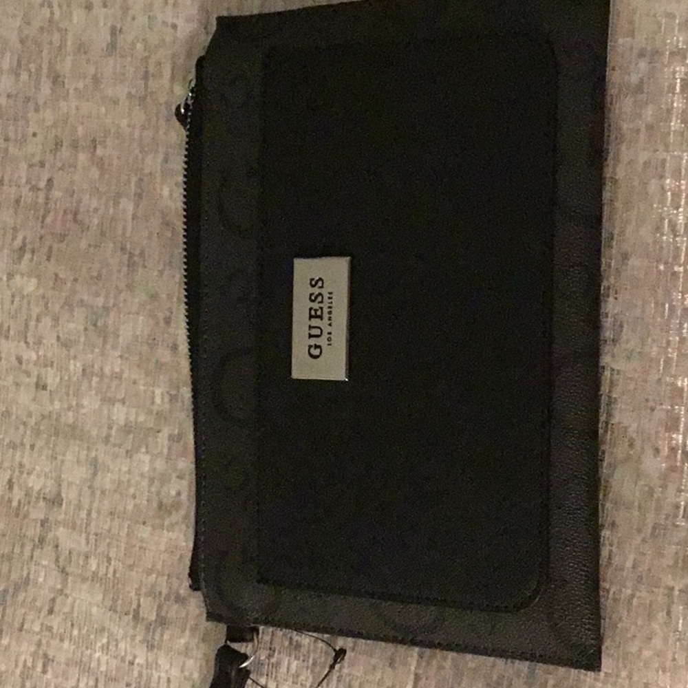Guess women’s wristlet